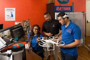 UF Engineering students working on a drone.