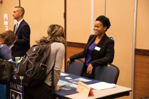 UF student talking to representative of a graduate school.