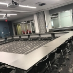 Picture of Innovation Rooms A & B with chairs and tables arranged in circle style