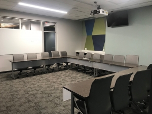 Picture of Conference Room with tables and chairs arranged in u-shape style